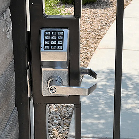 Keypad lever lock mounted on a gate post