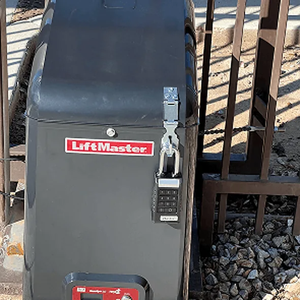 Gate operator housing secured with a keypad padlock